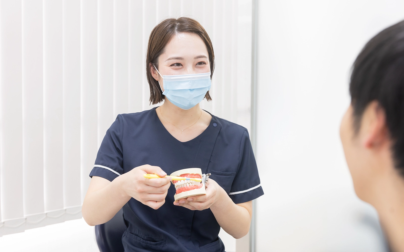 保護者の方への仕上げ磨き指導